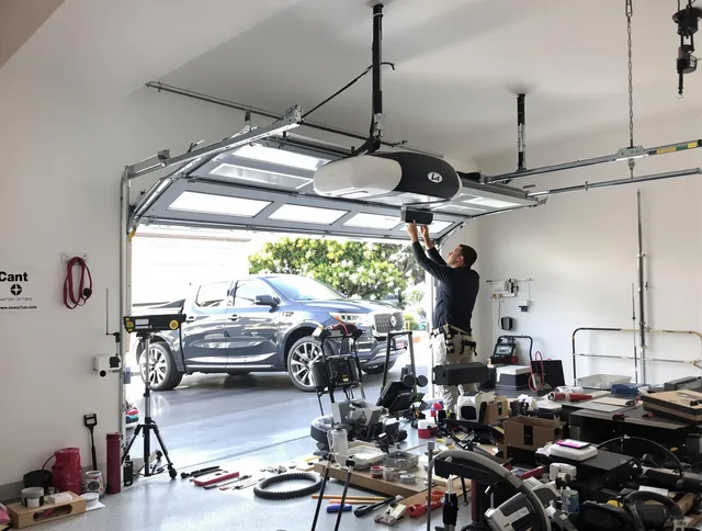 Cornelius Garage Door Repair specialist installing smart garage door opener system in Cornelius home