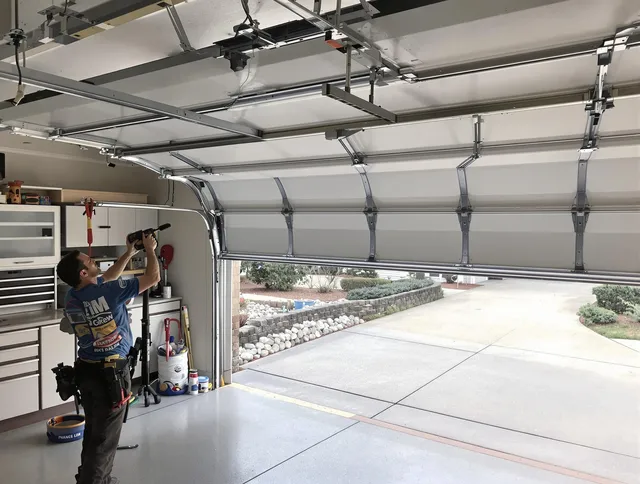 Garage door track repair service by Cornelius Garage Door Repair in Cornelius